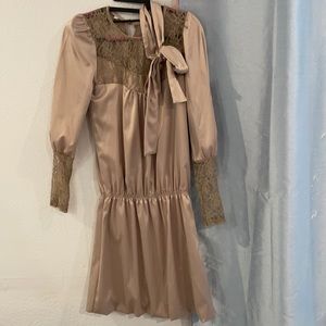 Made in Korea. Beige long sleeve dress with belt.